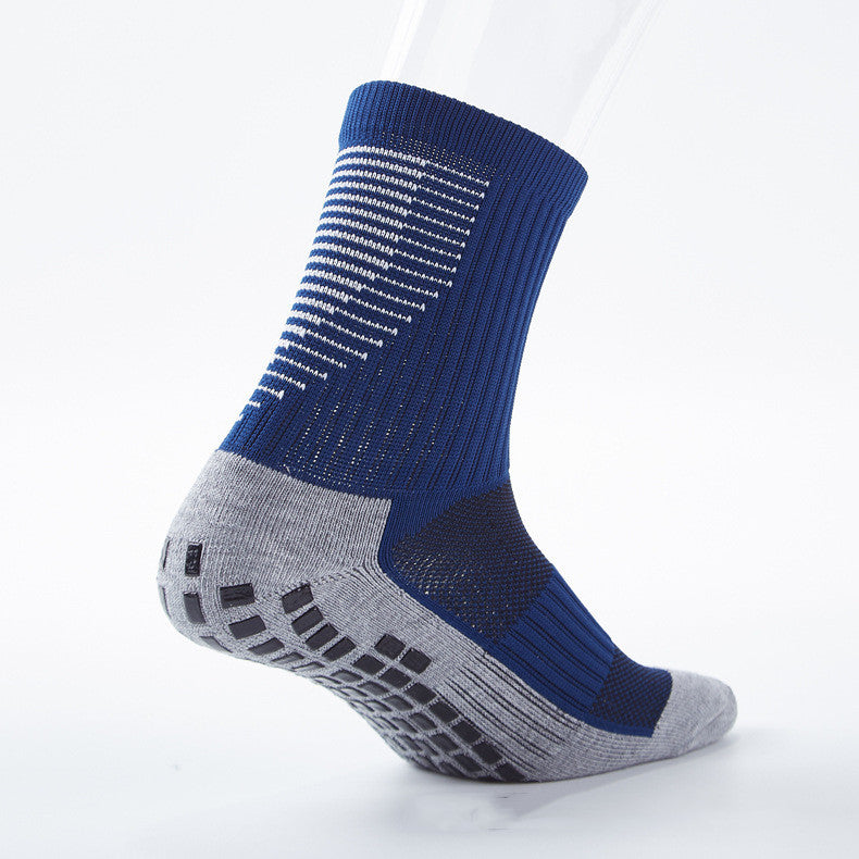 Sports man in striped football socks